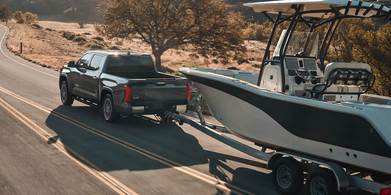 A 2025 Toyota Tundra towing a boat