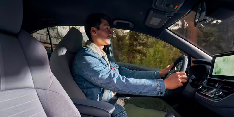 A driver satisfied as he just successfully financed his new Toyota Corolla in Ardmore, PA