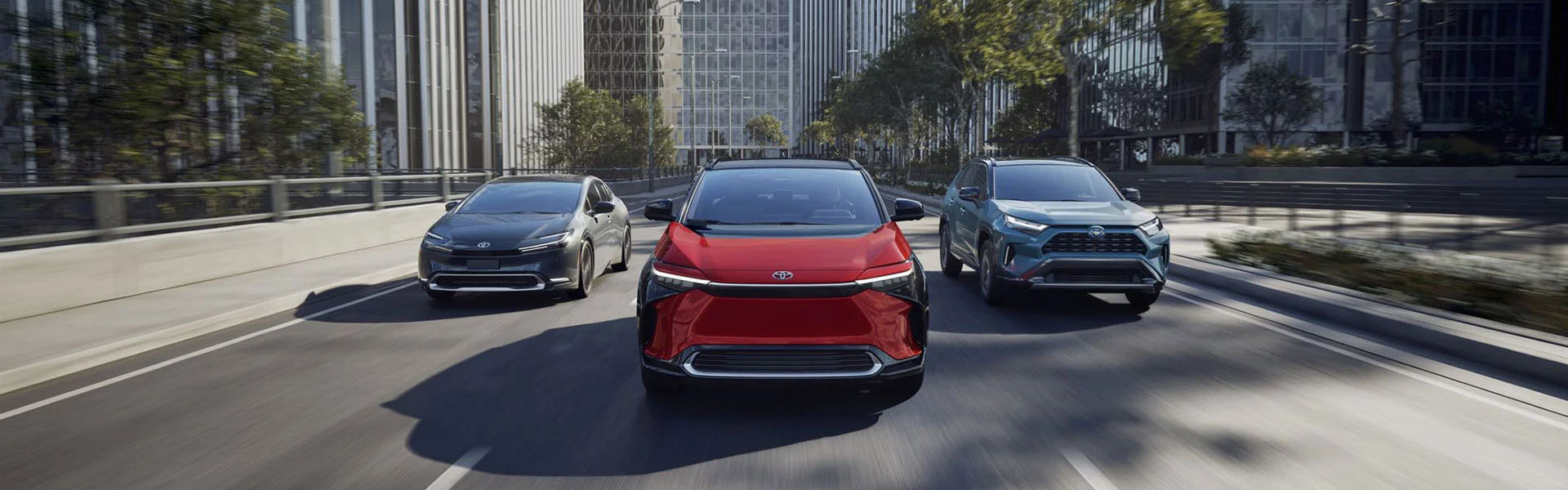 Toyota vehicles driving through city streets