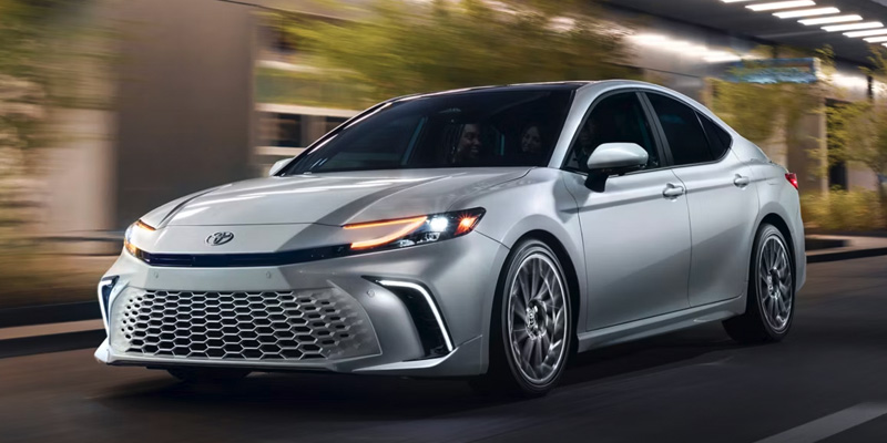 A 2026 Toyota Camry zooming through the streets of Philadelphia, PA