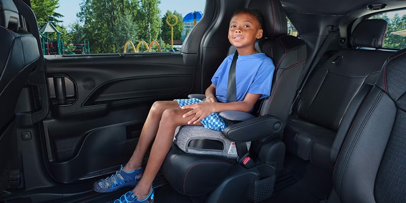 A child enjoying the interior of the 2025 Toyota Sienna in Ardmore, PA